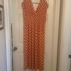 This beauty has a good stretch. The front of the dress is just like the back.